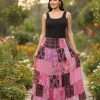 Woman in colorful patchwork skirt